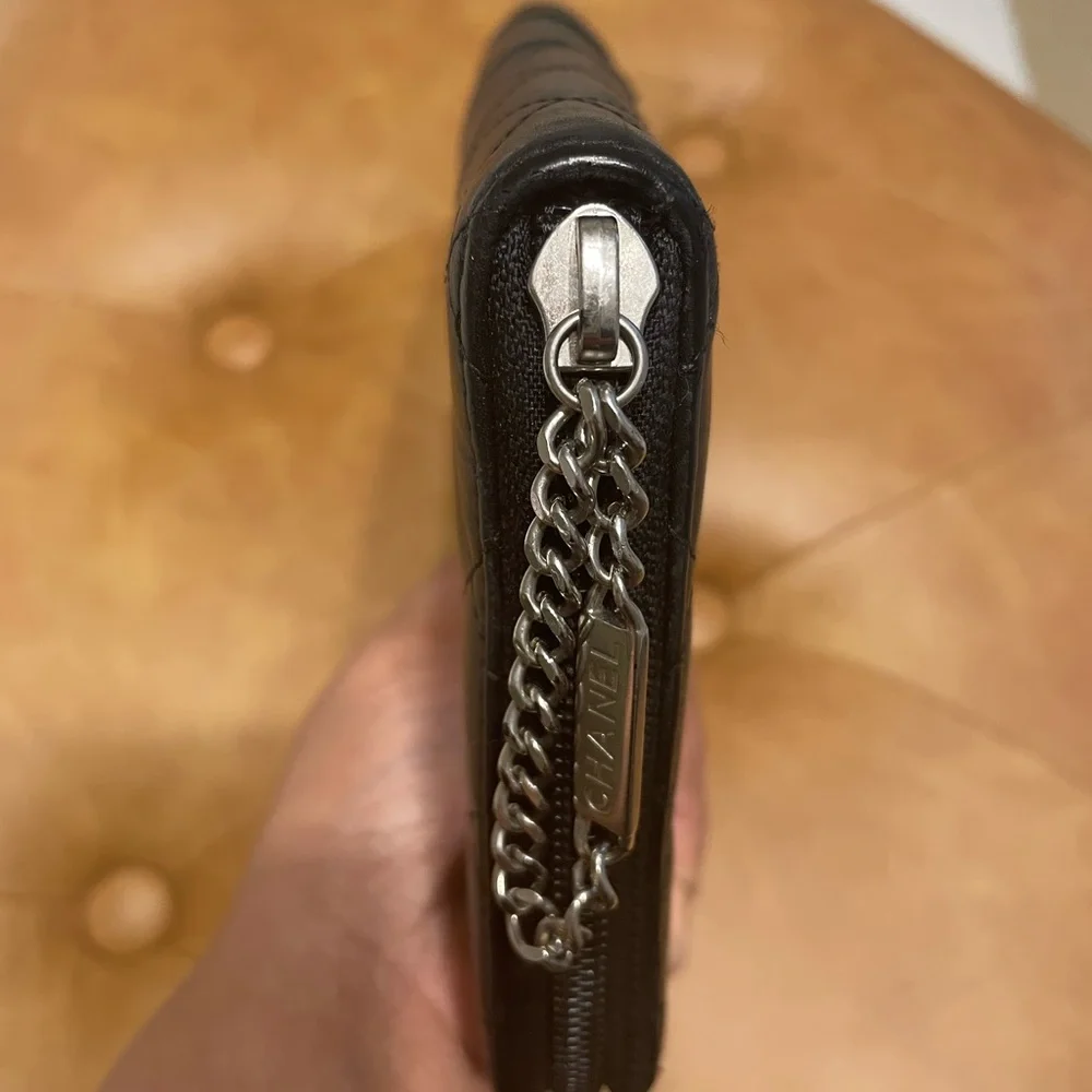 CHANEL Black Quilted CC Zip-Around Wristlet Clutch